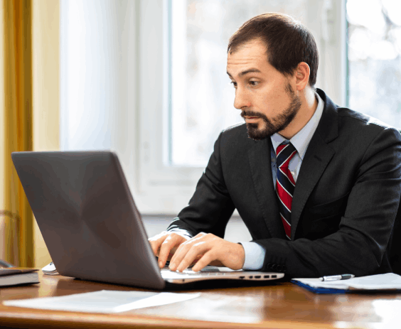 A typist providing a Chicago business owner by typing legal documents accurately and quickly, saving them time.