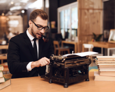 A typist enters a handwritten manuscript page into Word, using London Typing Services for accurate book typing.