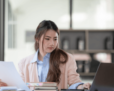 A certified typist shows Microsoft Office Specialist results for Outsourcing Typing Services while preparing Word and Excel.