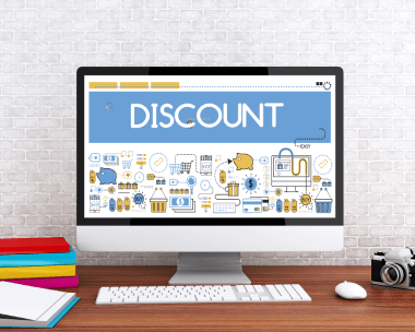 A computer displaying the word Discount, emphasizing discounts for bulk typing service rates orders.