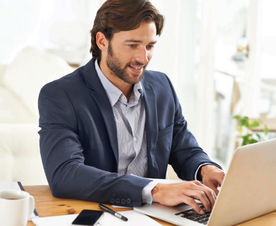A typist converts scanned pages into editable Word files, using London Typing Services for precise document formatting.