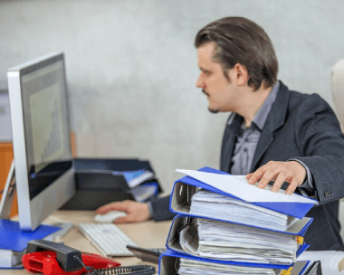 A document formatting expert meticulously working on document formatting to ensure quality and readability.