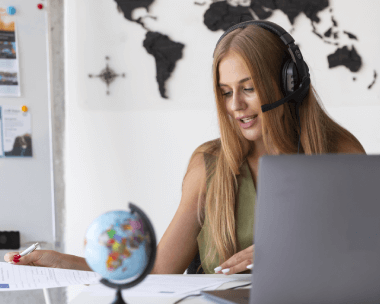 A woman provides multilingual typing services, ensuring accuracy and appropriate formatting across various languages.