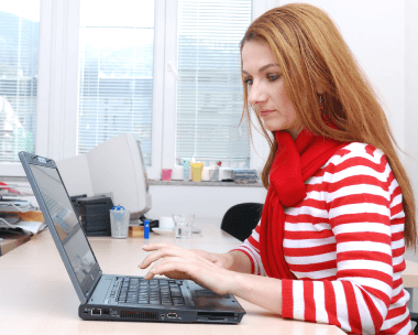 Client utilizing expert legal typing services in Lansing, helping law firms create accurate and fast legal documents.