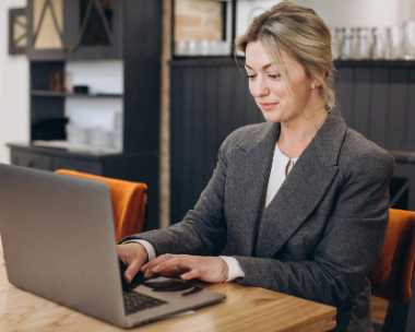 A typist reviews a transparent pricing quote as London Typing Services prepares a budget-friendly document package.