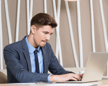 Typist mastering Hebrew typing skills, learning the unique structure of the language to produce accurate, professional work.