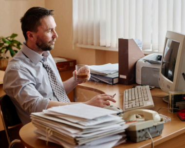 An admin types a long multi-page report and a short memo, using London Typing Services for reliable delivery.