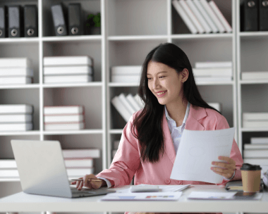 Typist working on multilingual document typing services in Indianapolis, offering precise results across various languages.