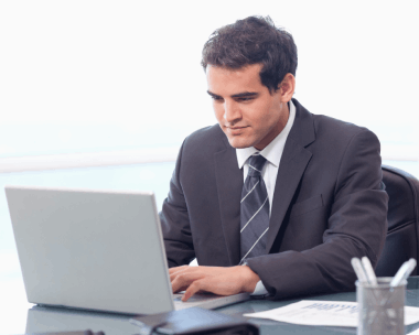 Customer receiving professional document typing services in Boise, converting handwritten notes to digital documents.