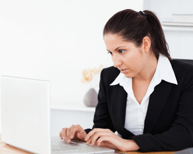 A professional typist working on complex legal and narrative inputs using French Typing Services with precision and clarity.