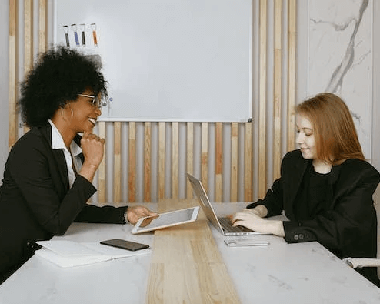 A manager briefs a typist how to deliver professional typing services in San Diego.