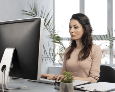 A client emails a revision-policy request for Outsourcing Typing Services, attaching source and delivered files with notes.